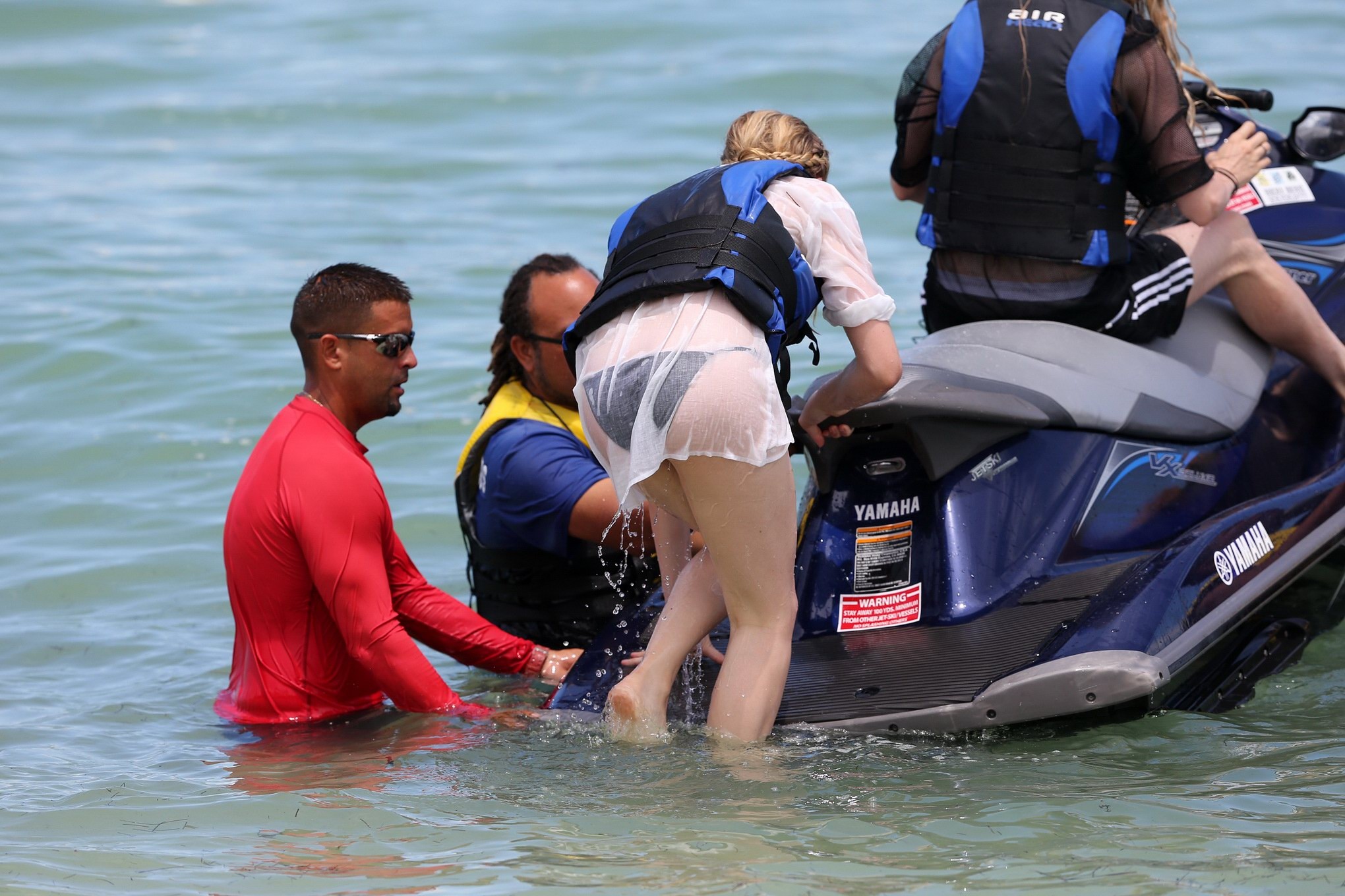 Chloe Moretz shows off her juicy ass in a skimpy black bikini at the beach in Mi #75189081