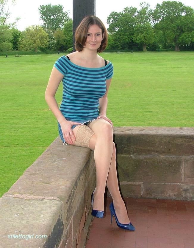 Stiletto girl in stockings outdoors #74792565