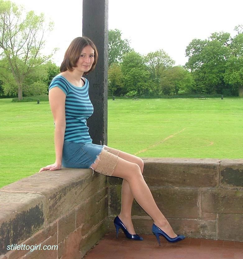 Stiletto girl in stockings outdoors #74792569