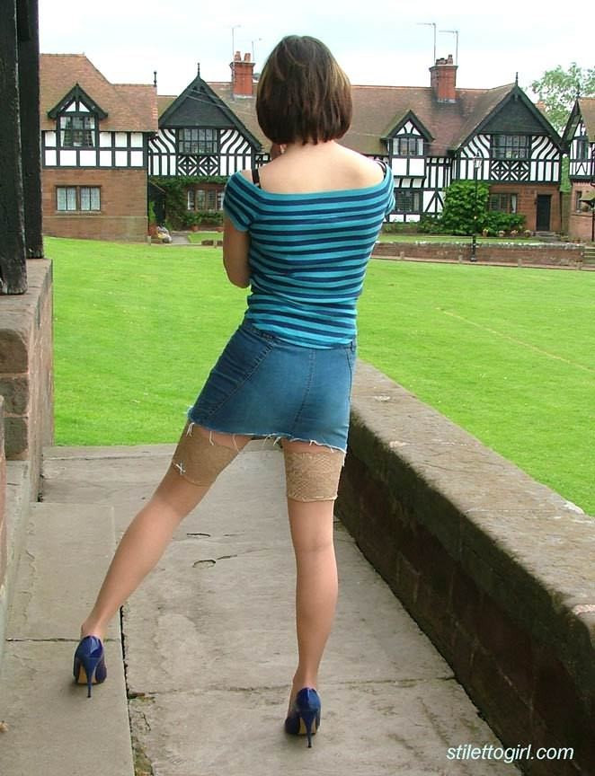 Stiletto girl in stockings outdoors #74792636