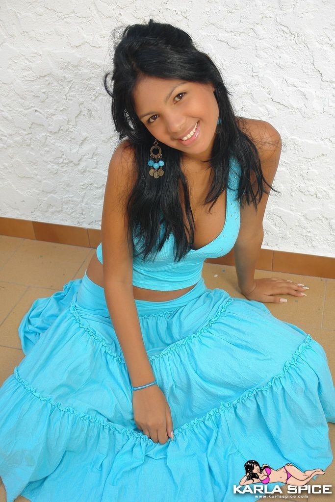 Petite latina teen teases the camera with her tight body #78001622