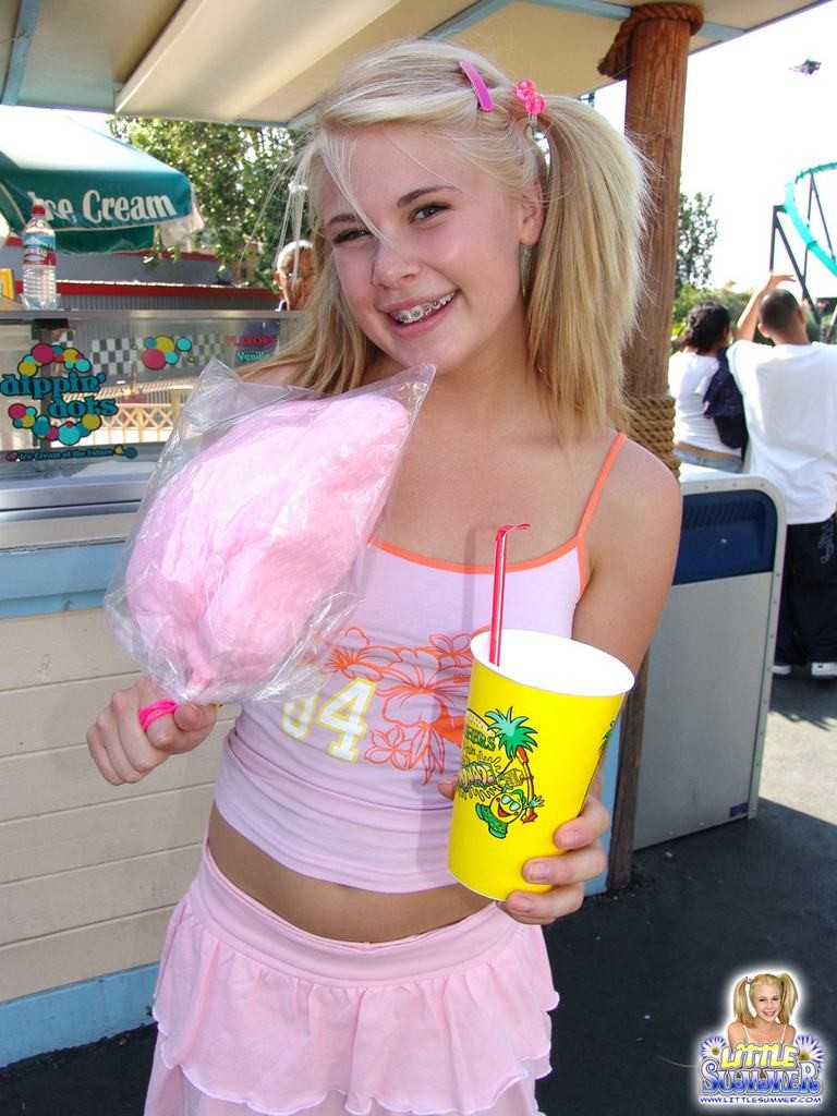 Pigtailed teen with braces amusement park flashing #78651750
