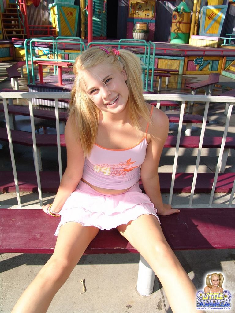 Pigtailed teen with braces amusement park flashing #78651757