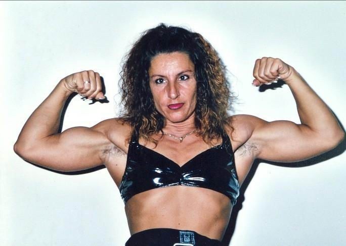 female bodybuilders posing and in action #76492257
