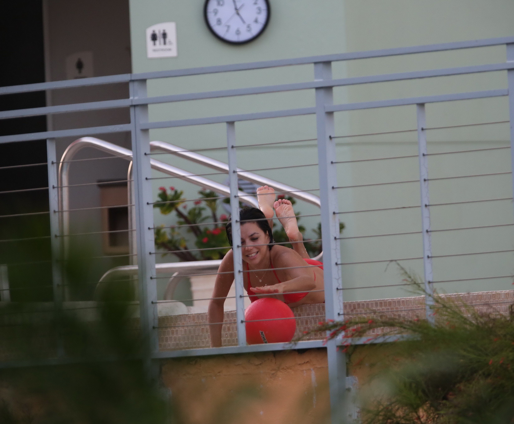Eva Longoria shows off her round ass in a skimpy red bikini at the pool in Miami #75179923