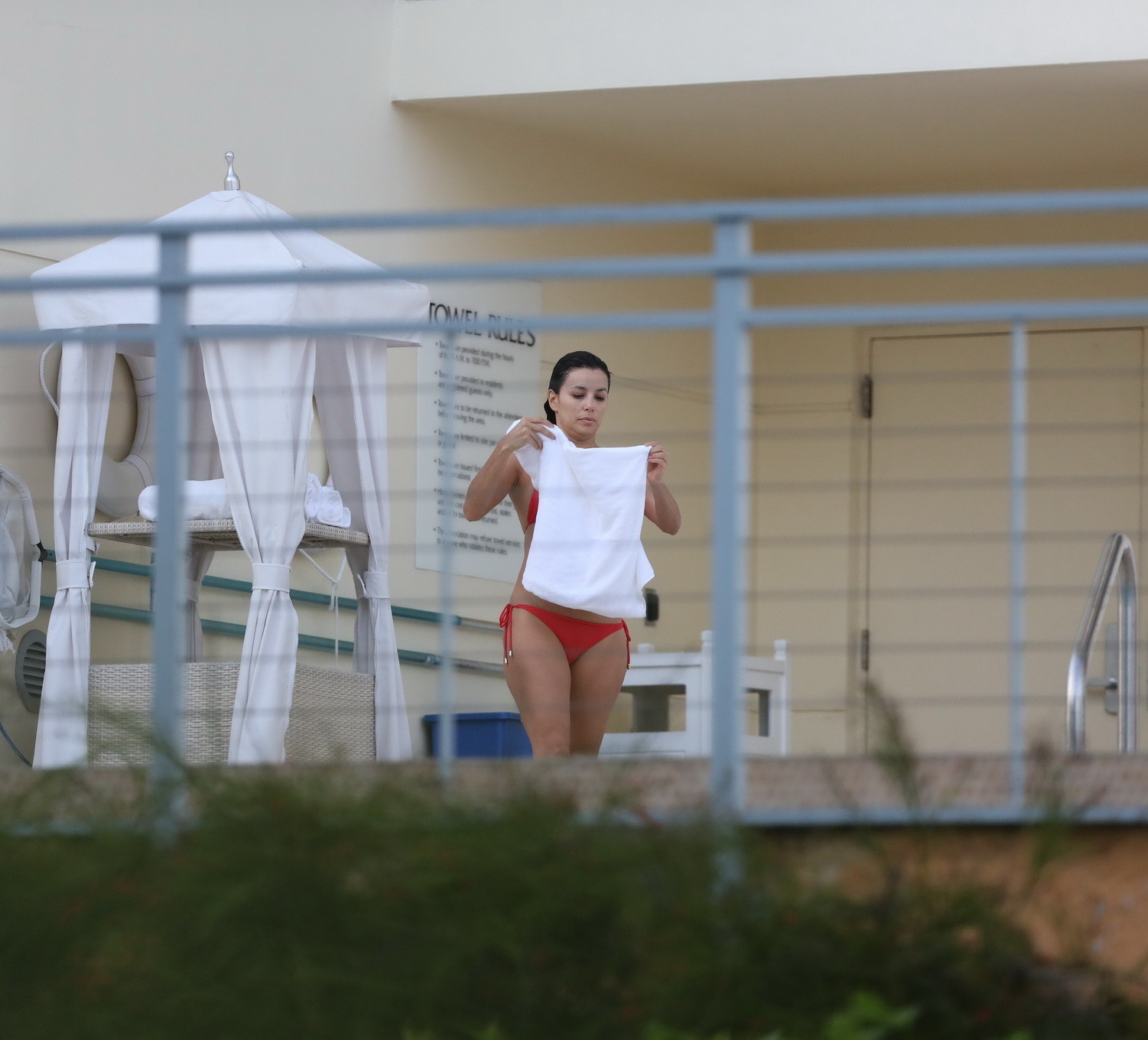 Eva Longoria shows off her round ass in a skimpy red bikini at the pool in Miami #75179957