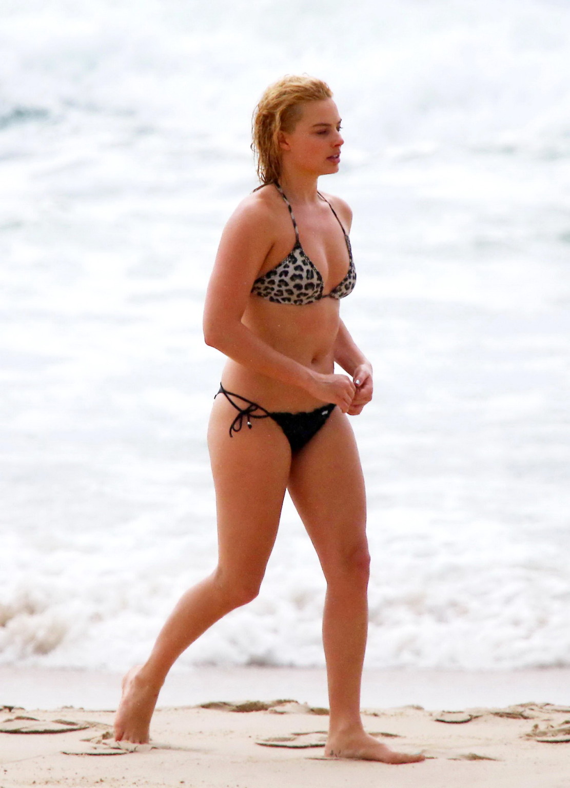 Margot Robbie showing off her bikini body at a beach in Byron Bay #75176988