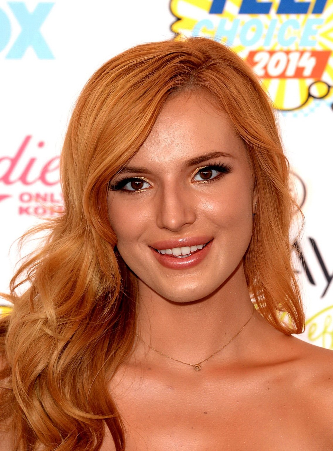 Bella Thorne braless wearing a strapless dress at the 2014 Teen Choice Awards in #75188507