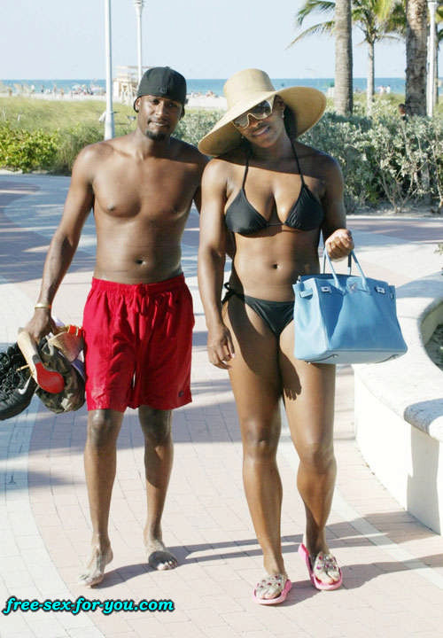 Serena Williams in black bikini on beach with her boyfriend #75433337
