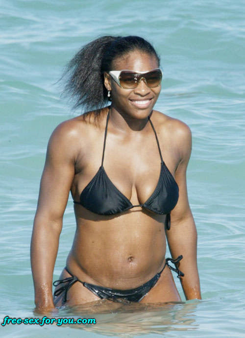 Serena Williams in black bikini on beach with her boyfriend #75433371