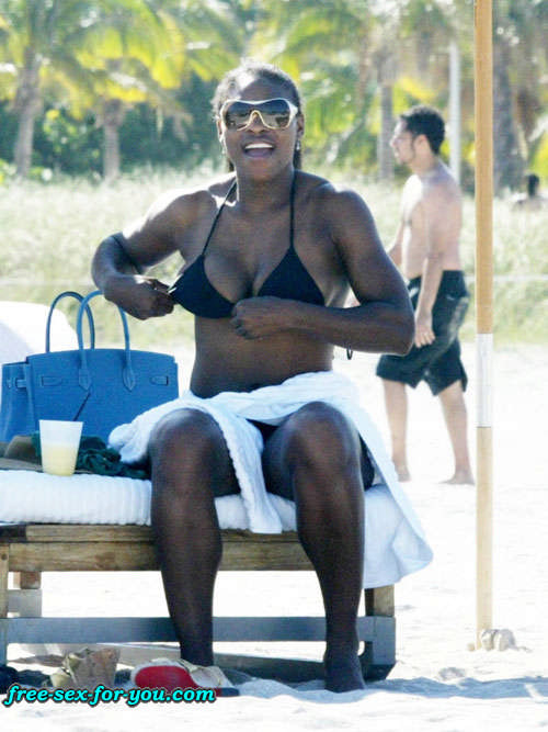 Serena Williams in black bikini on beach with her boyfriend #75433388