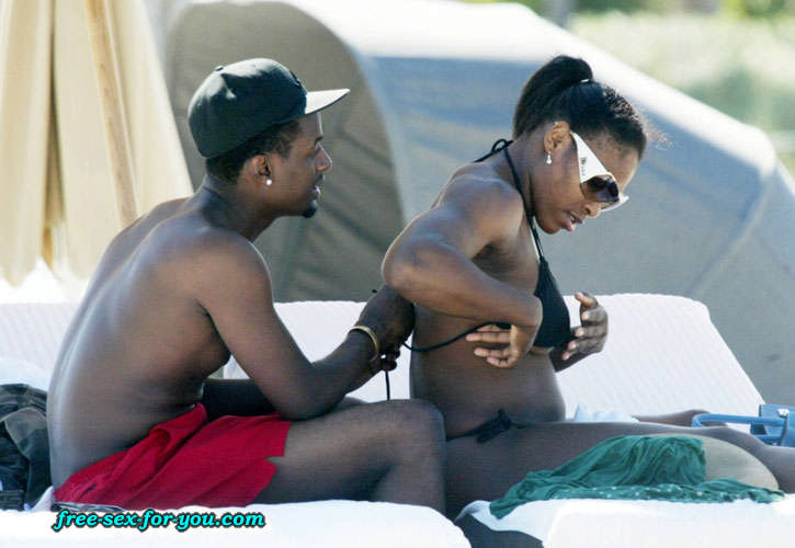 Serena Williams in black bikini on beach with her boyfriend #75433416