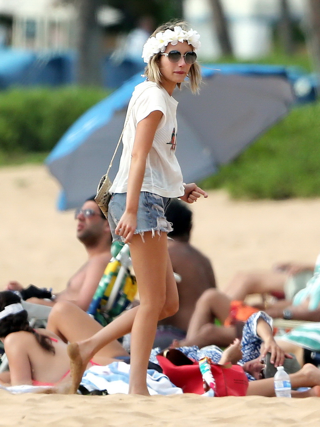 Emma Roberts wearing bikini top and shorts on a beach in Maui #75194807
