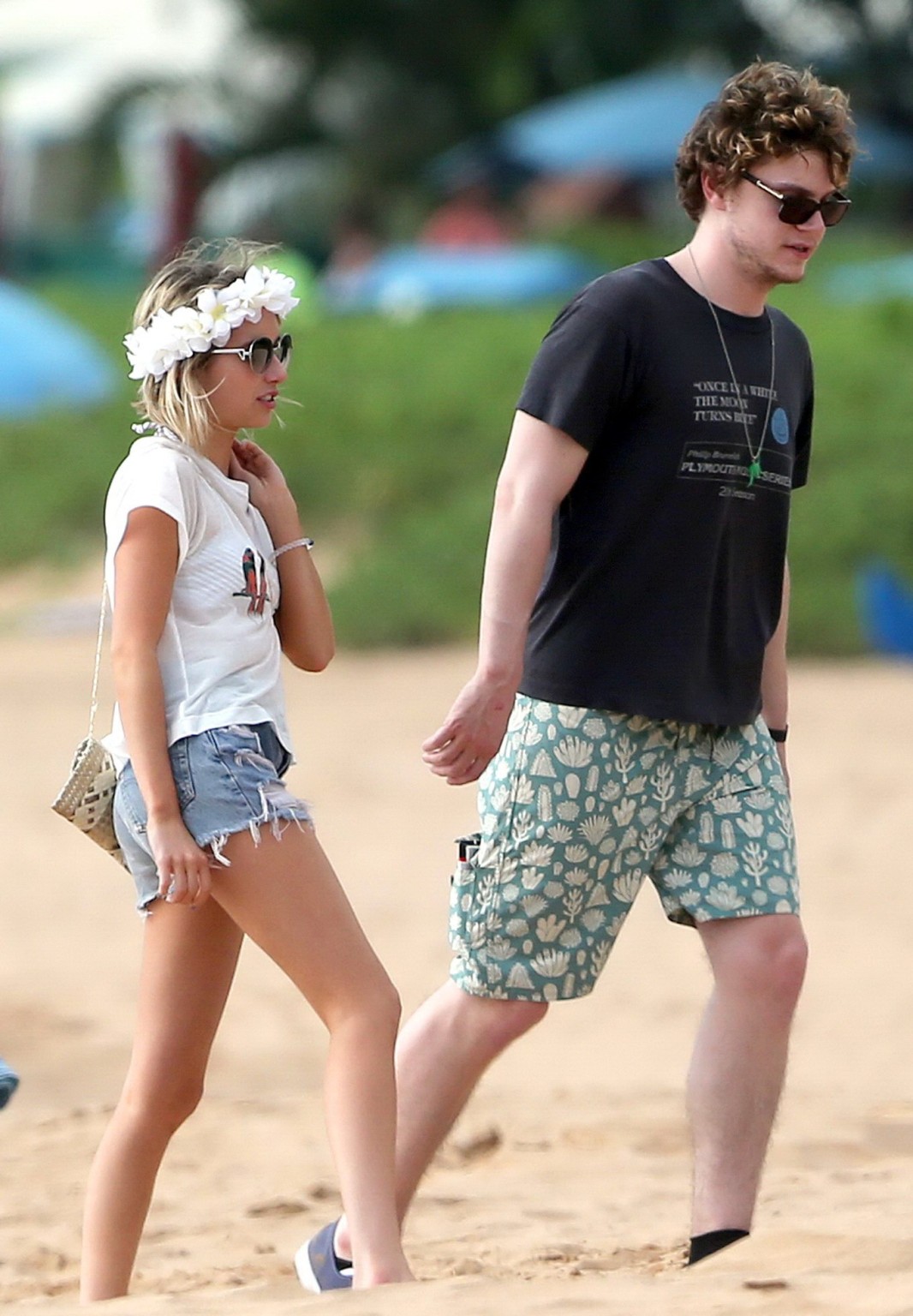 Emma Roberts wearing bikini top and shorts on a beach in Maui #75194973