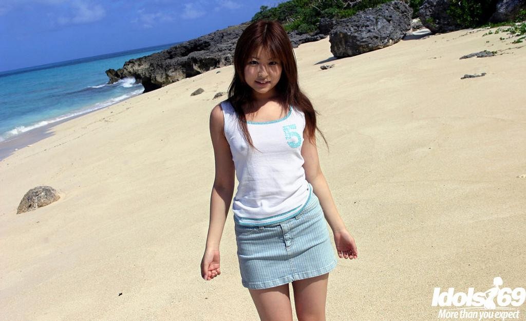Tiny titted petite Asian teen slips off thong and poses on beach #69963748