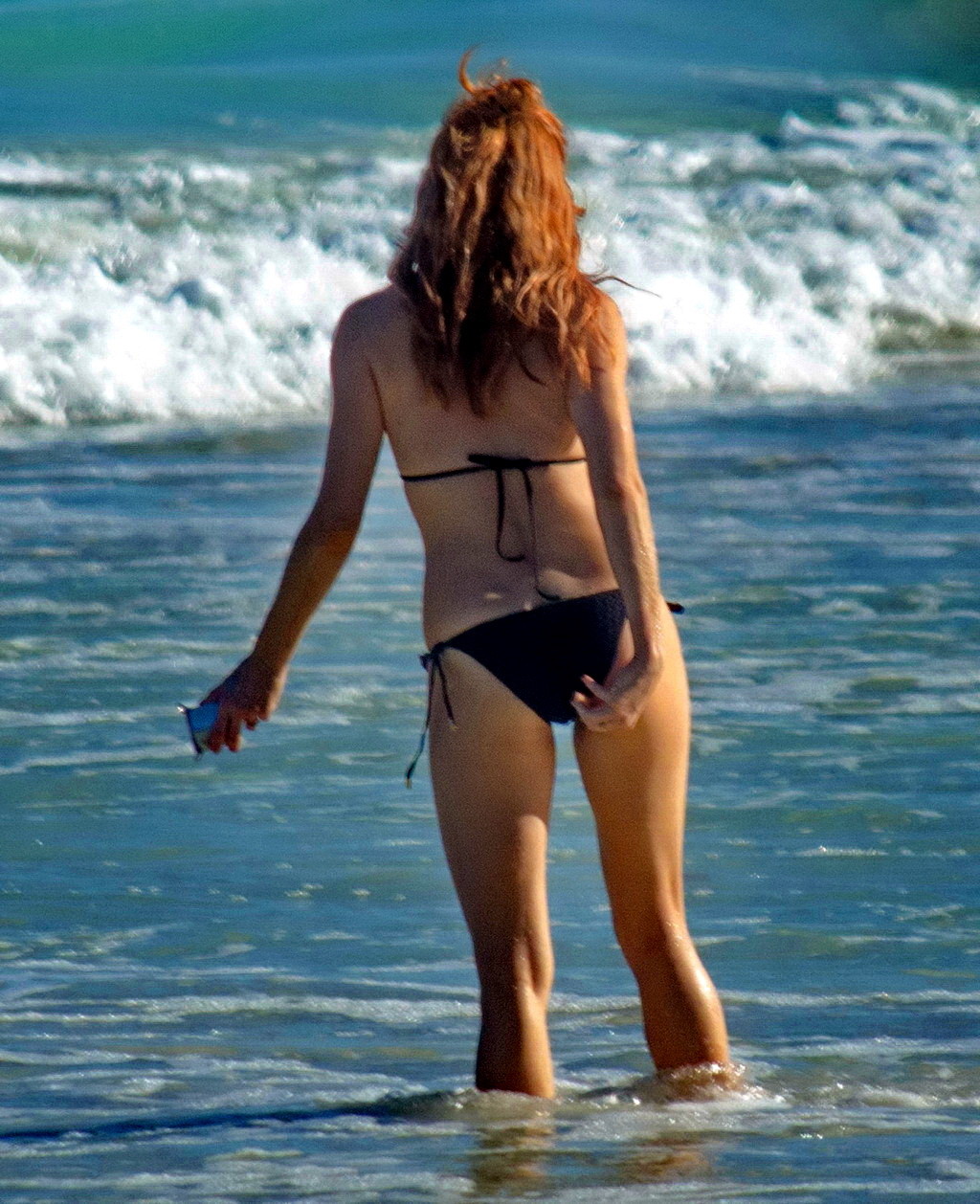 Sienna Miller wearing a black bikini on a beach in Mexico #75206904