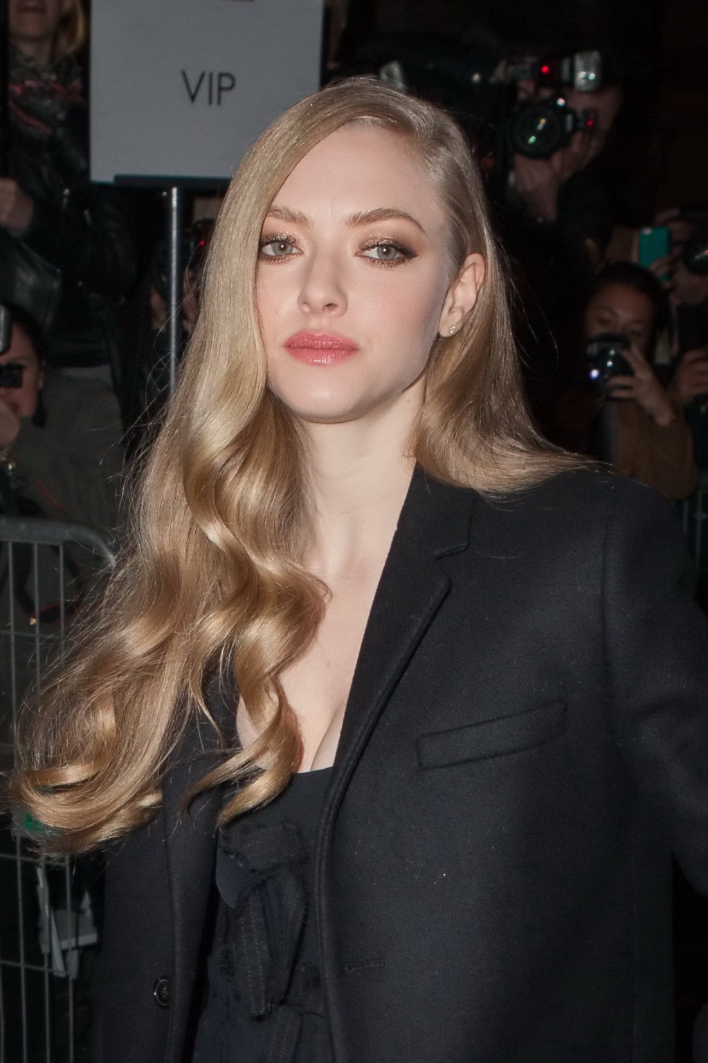 Amanda Seyfried showing big cleavage in black outfit while arriving to the Given #75170490