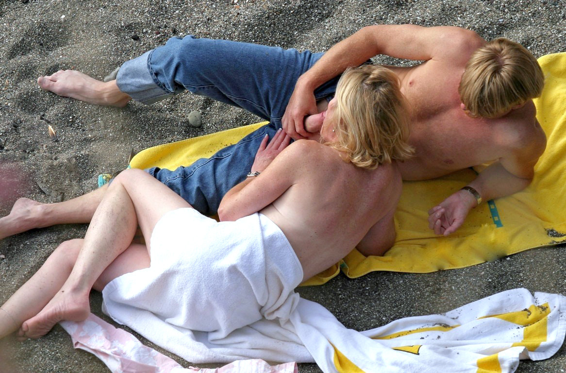 Busty girl shows her bare system at the nude seaside #72244979