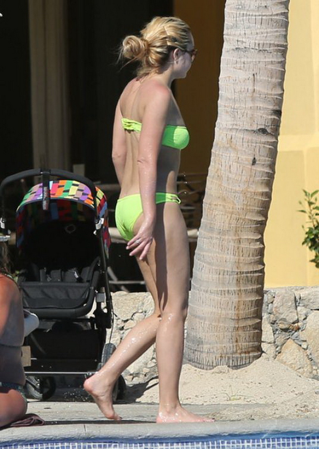 Amanda Bynes busty in yellow tube bikini poolside #75199489