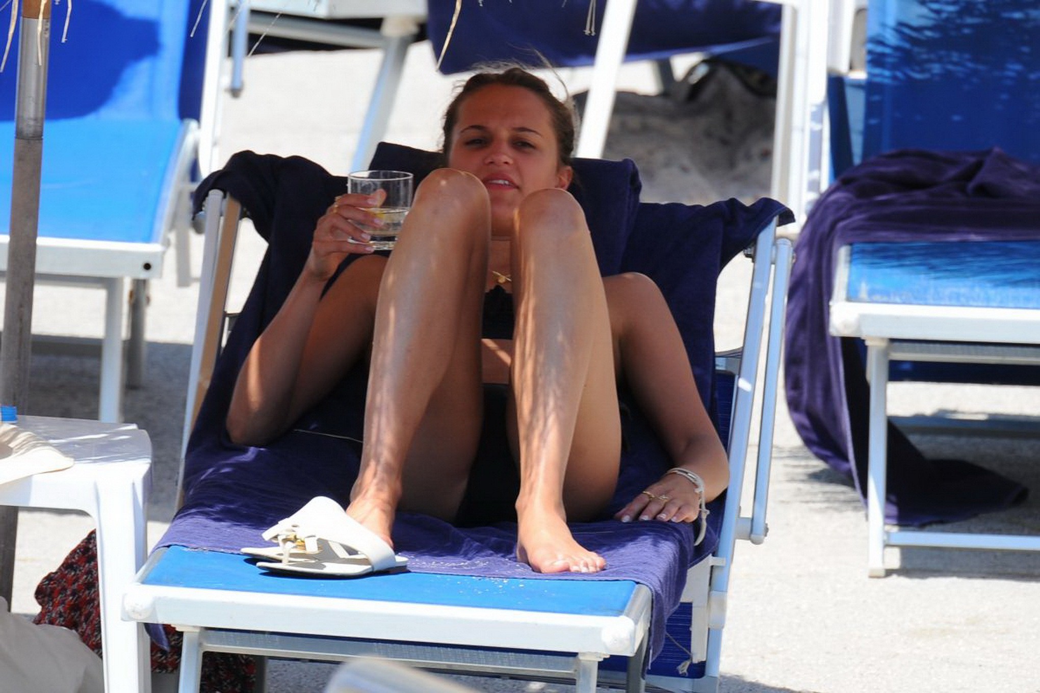 Alicia Vikander shows off her skinny bikini ass at a beach #75157704