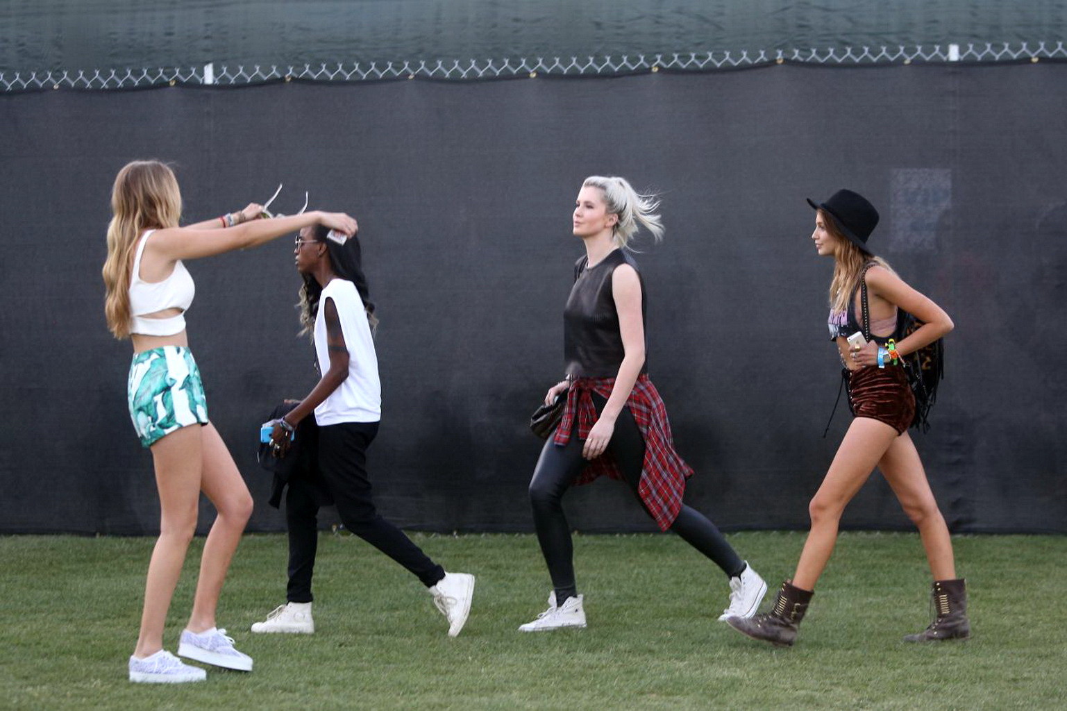 Ireland Baldwin braless shows off her boobs wearing a mesh shirt at Coachella Mu #75198762