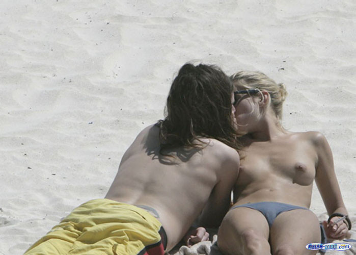 Sienna Miller showing her tits in topless on beach paparazzi pix #75416396