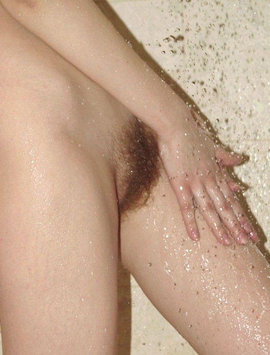 Redhead in shower washing her hairy pussy #77326381