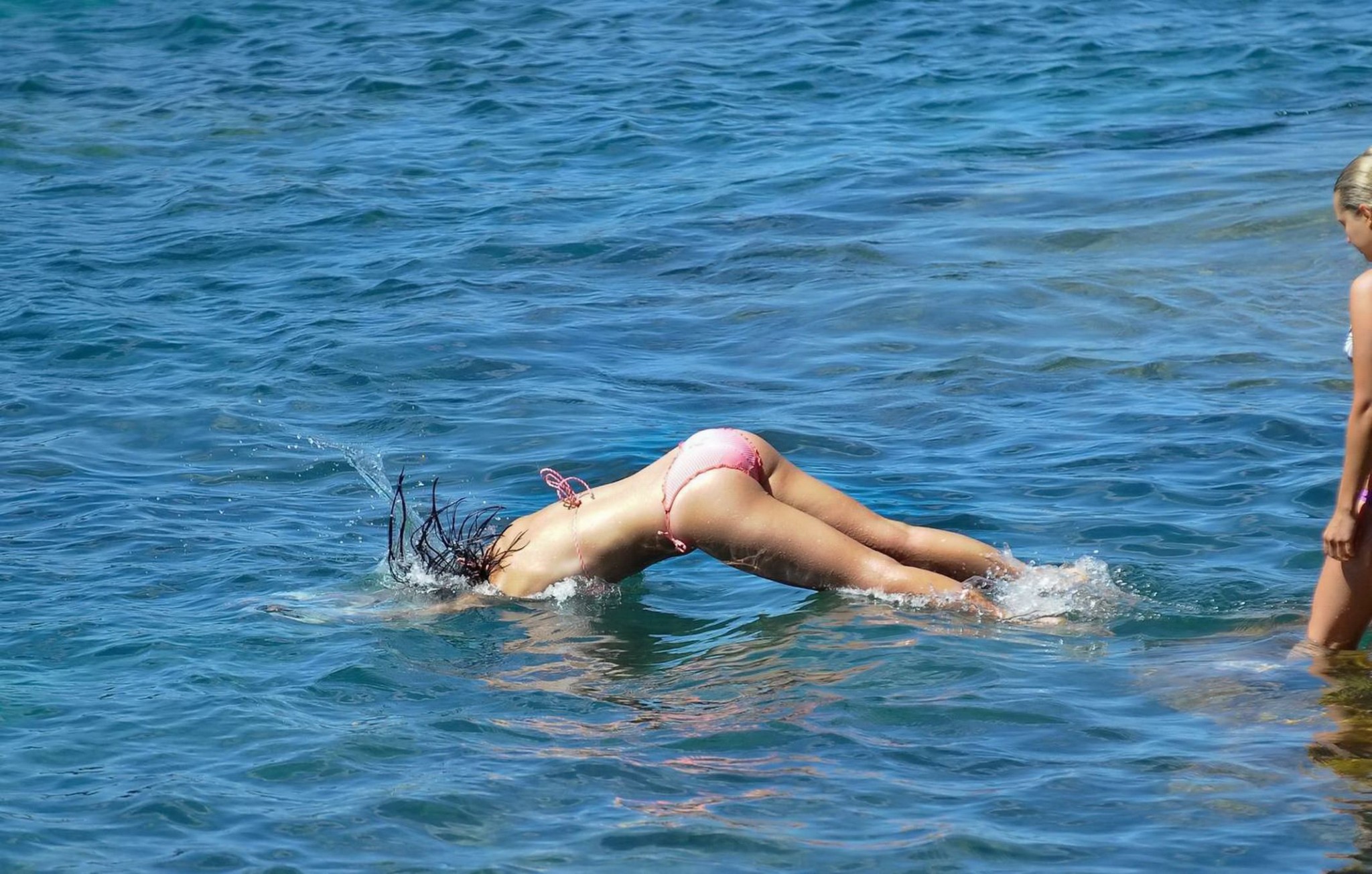 Demi Harman showing off her curvy body in a striped red bikini at the beach in S #75216070
