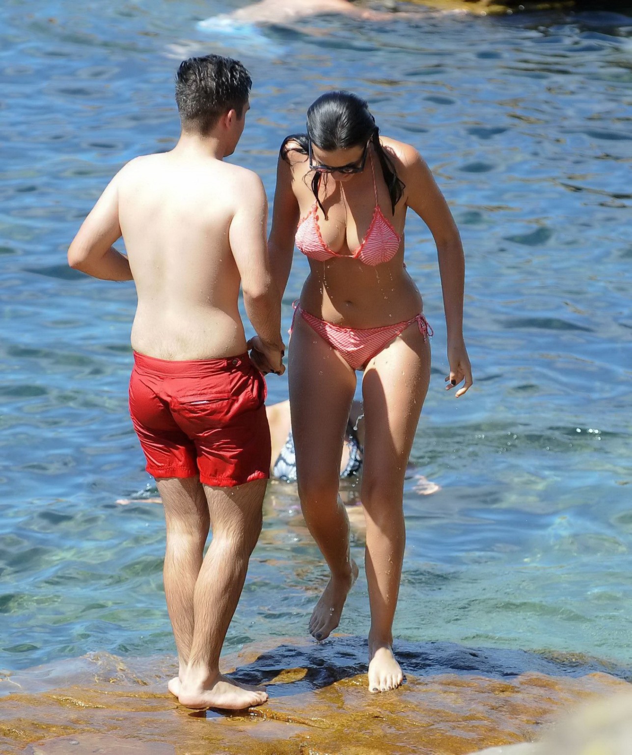 Demi Harman showing off her curvy body in a striped red bikini at the beach in S #75216095