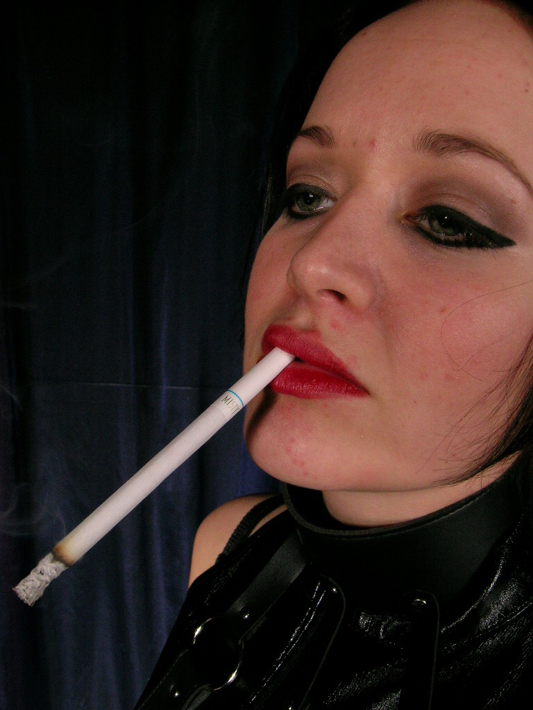 Sexy hot mistress wearing only leather smokes long cigarette #74905104