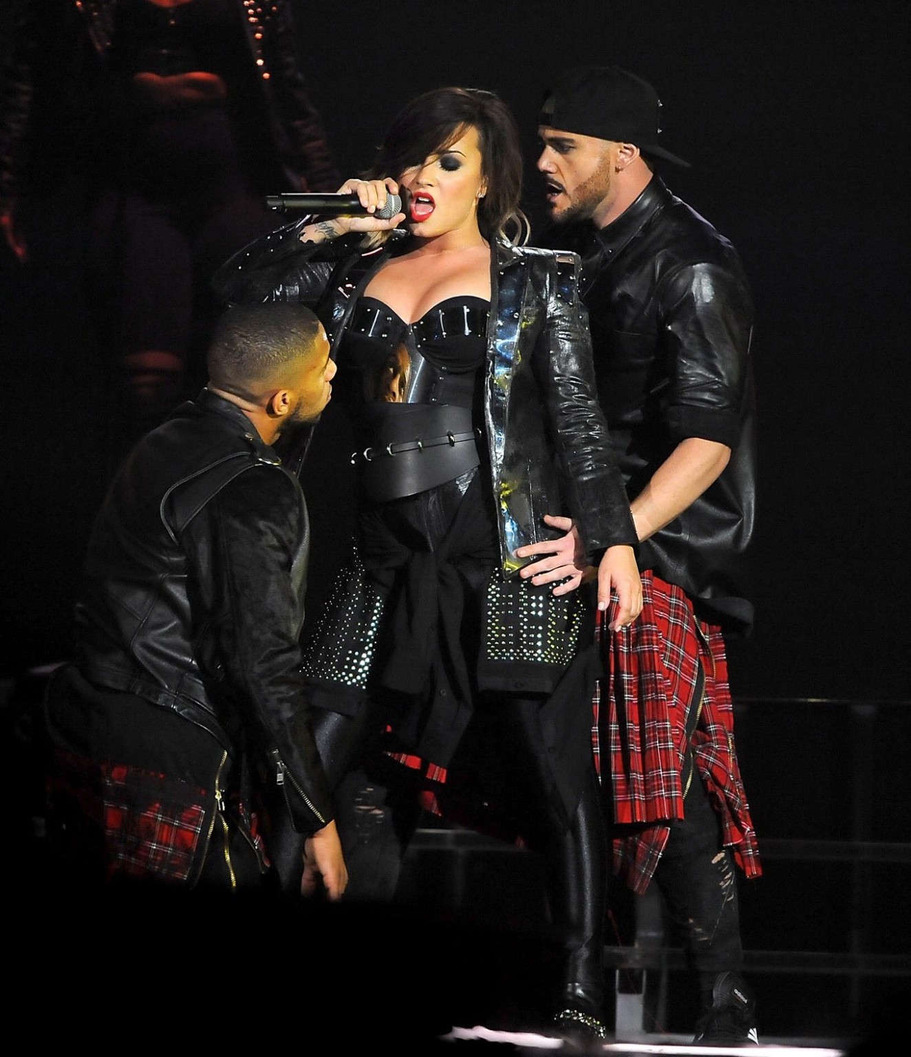 Demi Lovato in leather pants and metal corset performing on stage in Baltimore #75186216