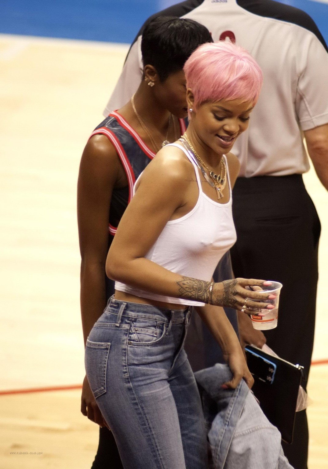 Rihanna braless wearing a white top at the Clippers game in LA #75196248