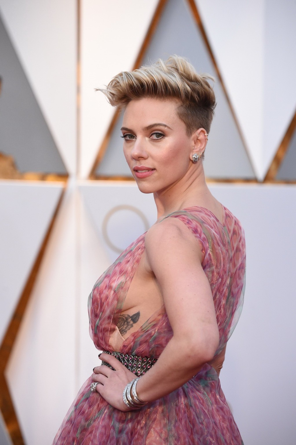 Scarlett Johansson shows sideboob in pink lace dress