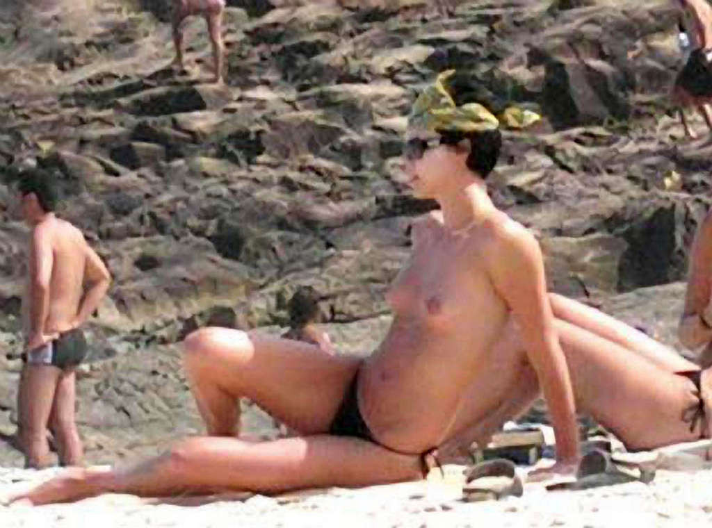 Charlize Theron showing tits on the beach and extremely hot body paparazzi pictu #75377152