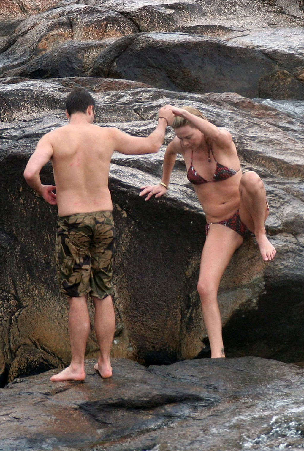 Charlize Theron showing tits on the beach and extremely hot body paparazzi pictu #75377217