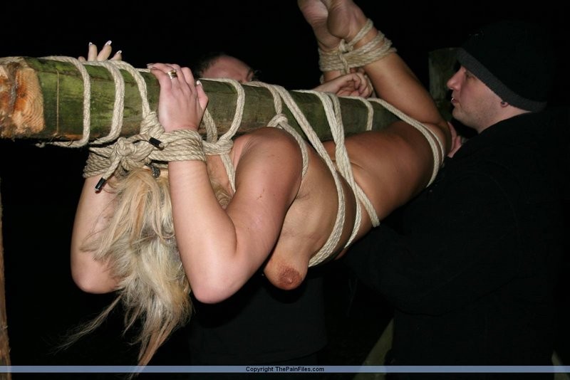 Blonde slave gets tied up to a stick #71869199