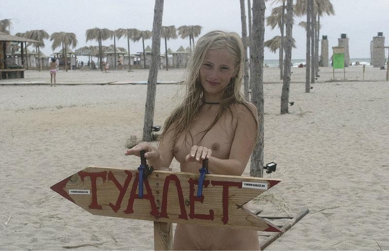 Naughty babe demonstrates off her privates on the sand #72252829