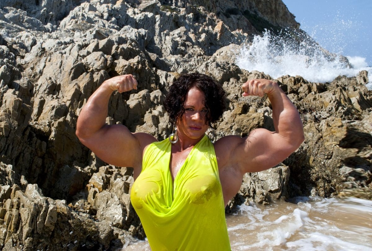 Massive female bodybuilder flexing her truly huge muscles #72258229