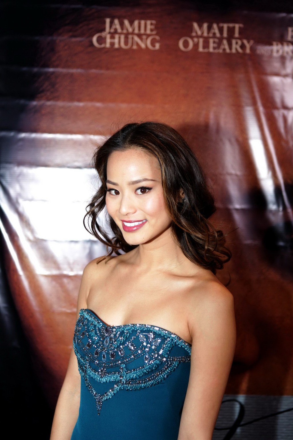 Jamie Chung cleavy wearing a tube dress at the 'Eden' premiere in LA #75236288