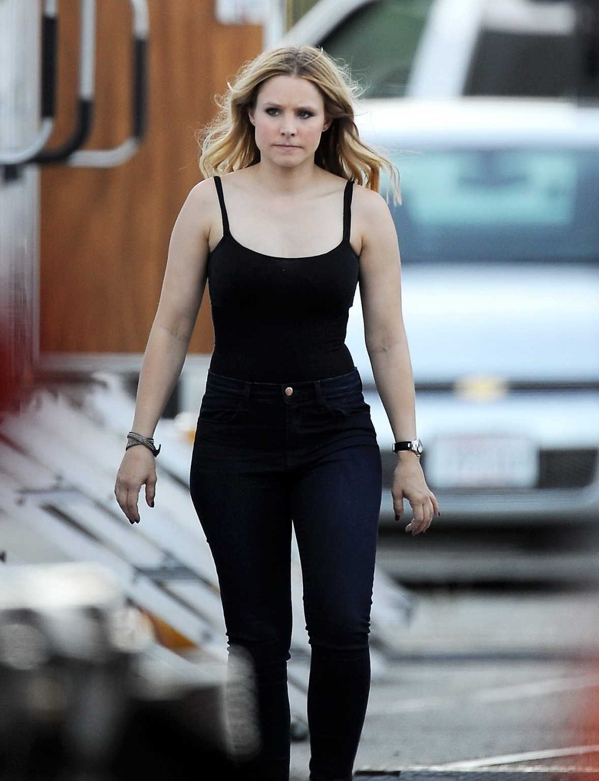 Kristen Bell slipping out of a skimpy black top on the set of Veronica Mars in L #75224512