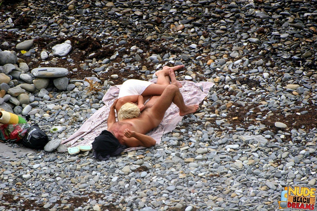 Horny couple enjoing sun and sex on the beach #67302007