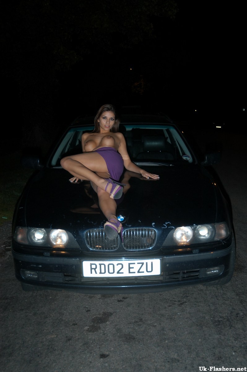 Cute amateur flashing outdoors at night on a car #67458499