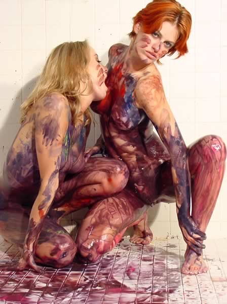 Lesbians playing with paint on each other body #74095035