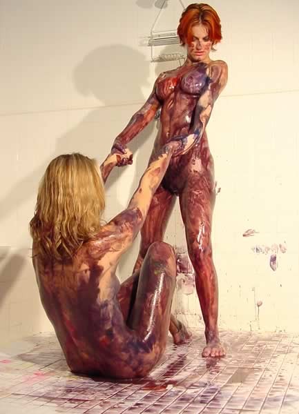 Lesbians playing with paint on each other body #74095049