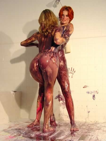 Lesbians playing with paint on each other body #74095055