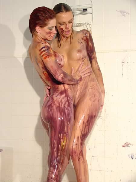 Lesbians playing with paint on each other body #74095061