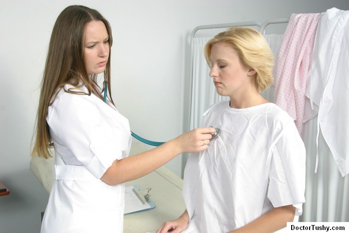 blonde teen getting a medical exam #73878840