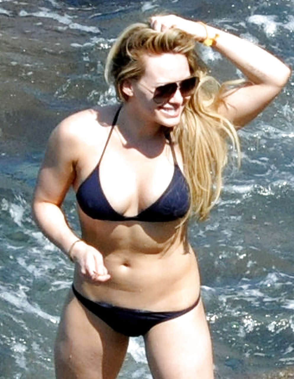 Hilary Duff showing her great body and looking sexy in black bikini #75296245