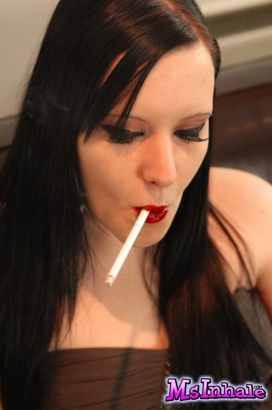 brunette teen smoking on the couch #74982045