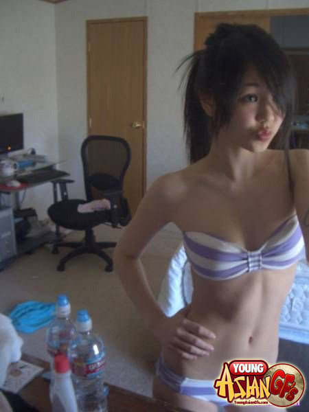 Asian girlfriends posing for cell phone pics #67344585
